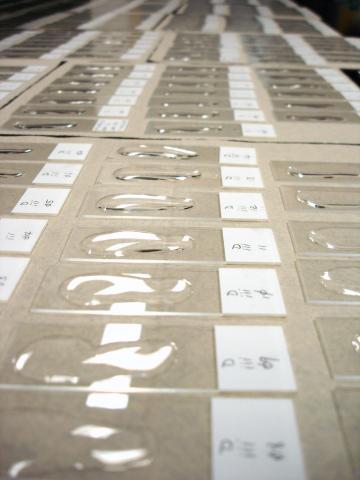 Waterborn actinospores being dried onto glass slides.